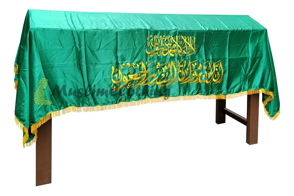 A green Islamic coffin cover with gold embroidery